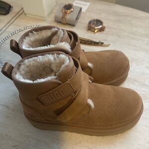 Cozy and classic UGG boots in size 5, Gently worn with minimal signs of use.